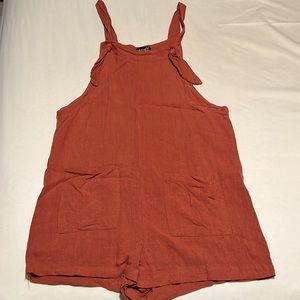 Red shorts romper with pockets
